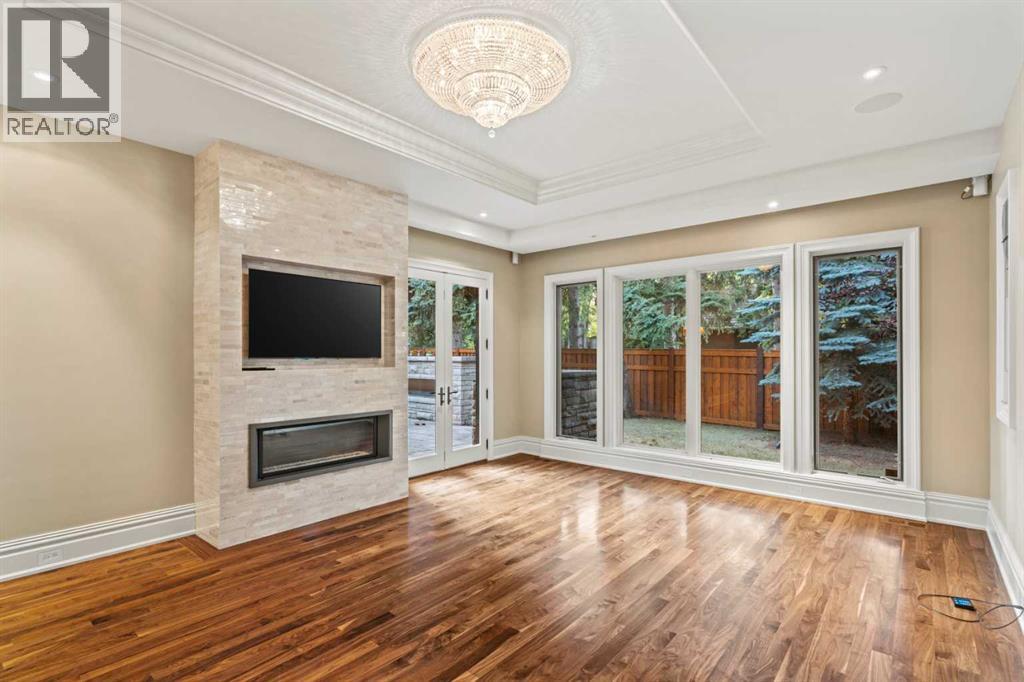 Owner's retreat with a fireplace