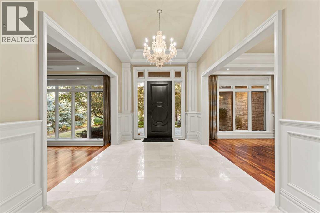 Marble foyer under 12-foot ceilings