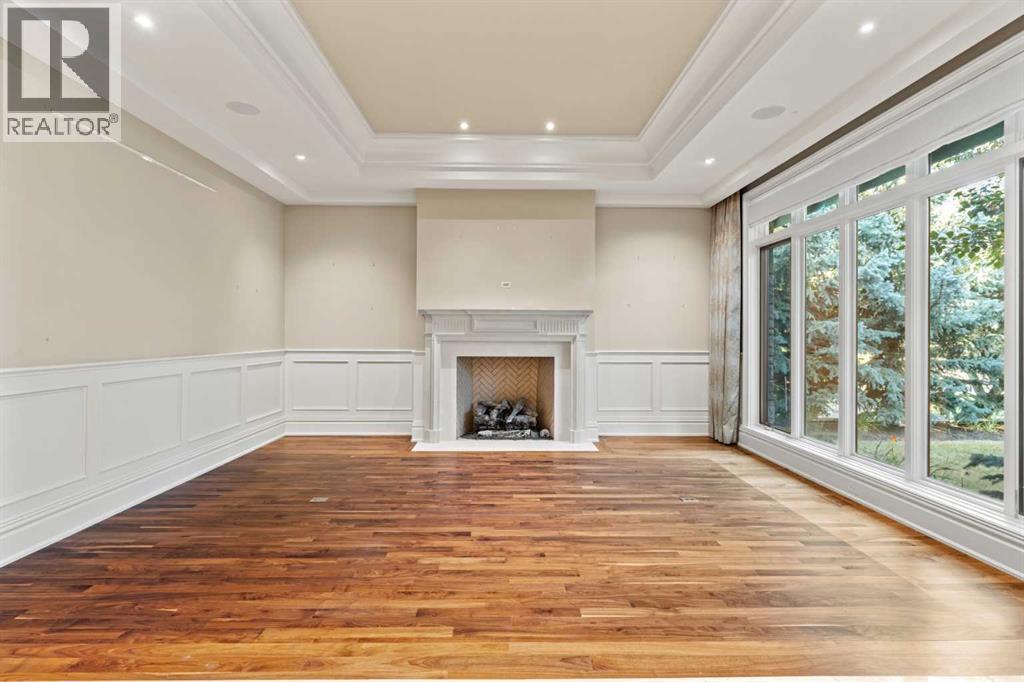 Living room with a marble fireplace